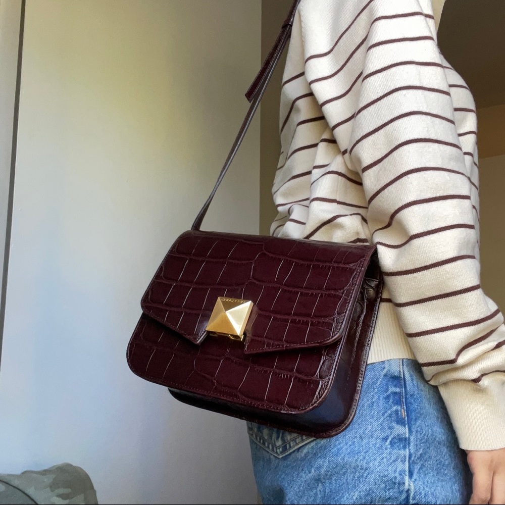 Cute Emp.t Label cross body bag.